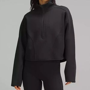 Lululemon mixed fabric half zip pull over size medium NWOT